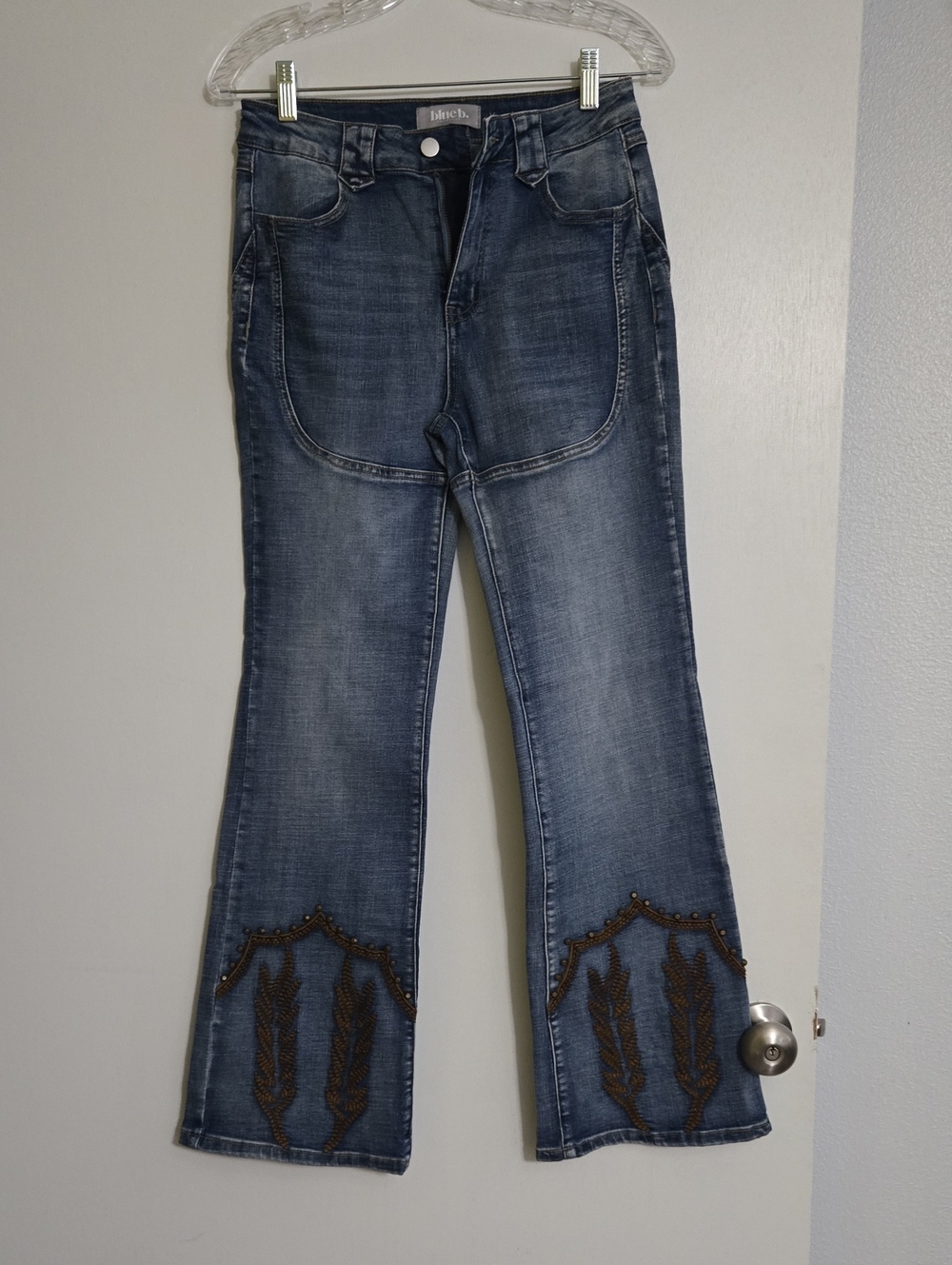 Embellished Dark Blue Flare Jeans with Decorative Hem